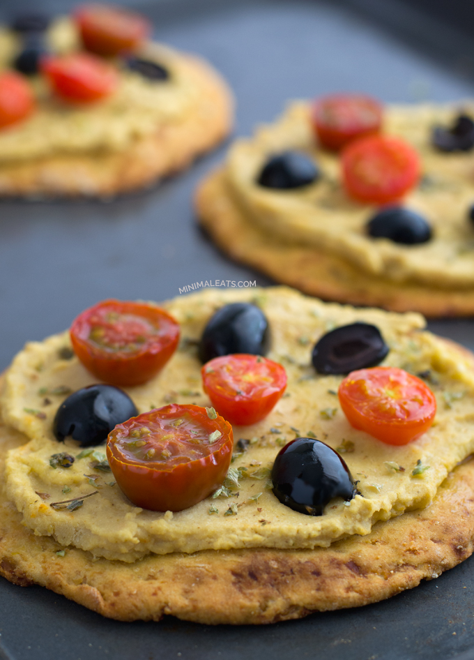 Black-olives-cherry-tomatoes-and-hummus-pizza