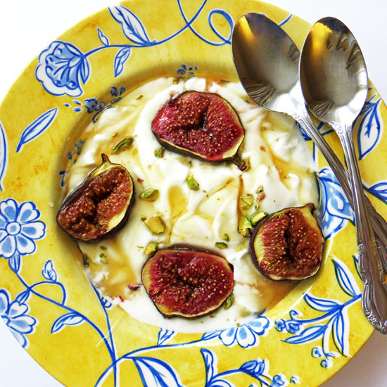 greek-yoghurt-with-roast-figs-honey-and-pistachios-550x550