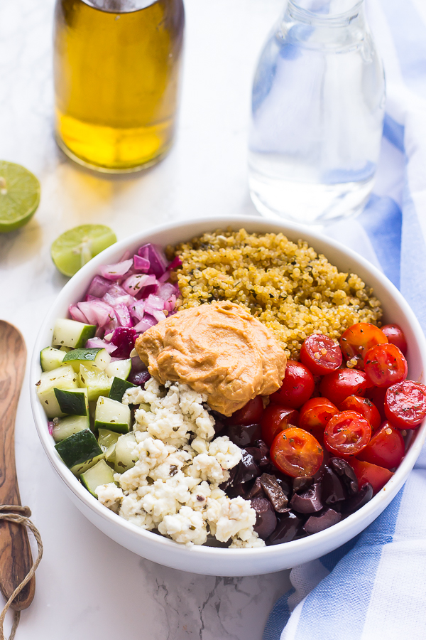 This-Mediterranean-Quinoa-Salad-Bowl-is-loaded-with-delicious-and-filling-veggies-topped-with-creamy-hummus-and-comes-together-in-just-20-minutes-3