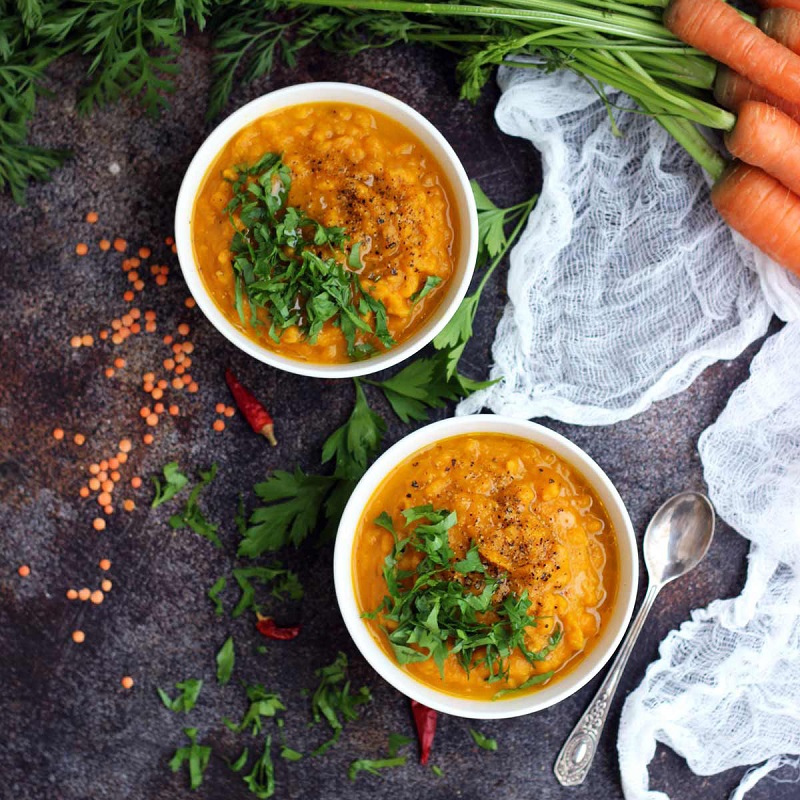 Vegan-Roasted-Carrot-Soup-with-Lentils-in-Bowls-Garnished-with-Parsley