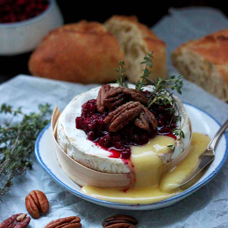 Easy-Gooey-Cranberry-Baked-Brie-Running-Centered-On-a-Plate